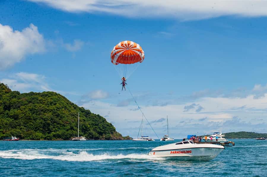 From Phuket: Coral Island Kahung Beach Speedboat Trip - Kahung Beach Setup: Chair, Drinks, and Easy Island Time
