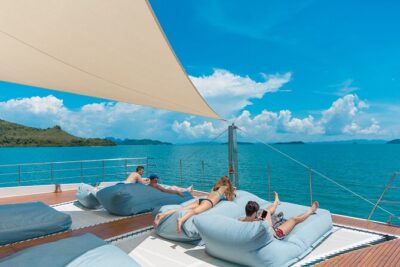 Luxury Boat to James Bond Islands with Lunch and Sunset Dinner - The Boat Life: DJ, Wi‑Fi, Water Slide, and Shade