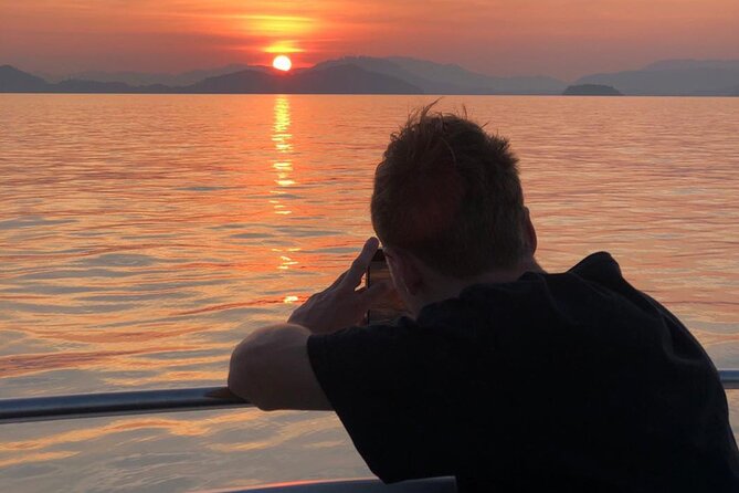 Phang Nga Bay Private Bioluminescence and Sea Canoeing Tour - Koh Panyee Village: a seafood meal break with a sunset feel