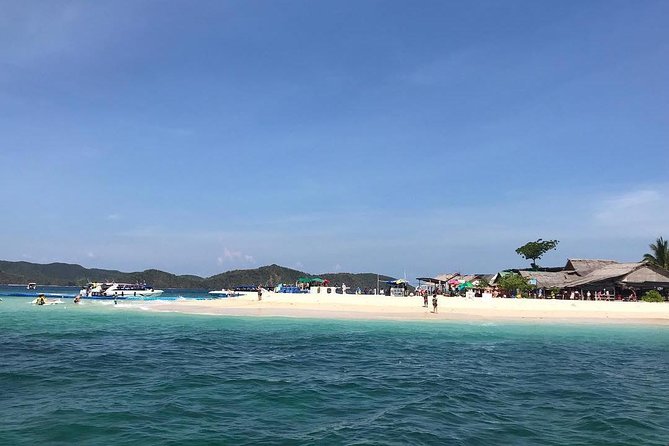 Phi Phi , Maya Bay & Khai Island snorkeling trip by Speed Boat - Stop 1: Pileh Bay and Pileh Lagoon Swim Time
