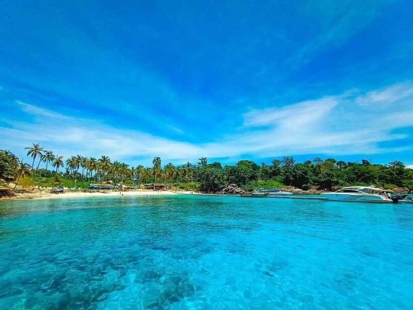 Phuket: Coral Yacht Boat Tour to Coral Island with Sunset - Yanui Bay Snorkeling: Reef Views and Tropical Fish Time