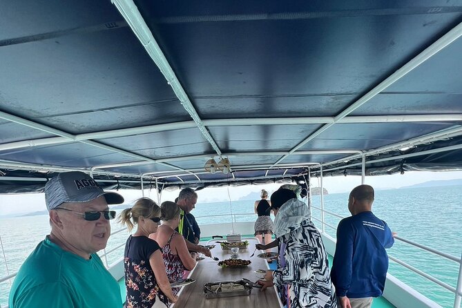 Twilight Sea Canoe Tour with Sea Cave Kayaking in Phang Nga Bay - Ao Phang Nga National Park Boat Time, Lunch, and Firefly/Night Viewing