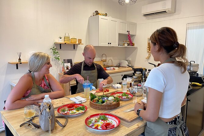 Unique Thai Cooking Experience in Patong with Chef Care - Welcome drink and studio setup: where Thai cooking clicks