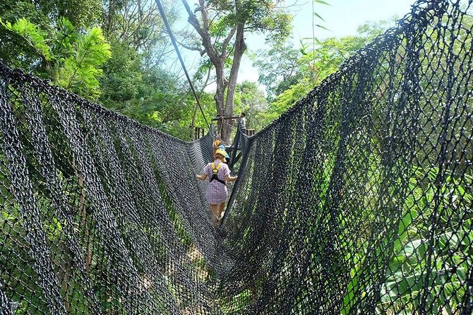 Zipline 18 Platforms and ATV Adventure Tour From Phuket - Treetop adrenaline: the zipline course and its set pieces